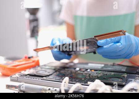 Technical engineer is working on computer motherboard Stock Photo