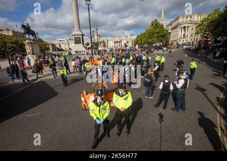 London, England, UK. 6th Oct, 2022. Climate campaign group Just Stop Oil protesters block road at Trafalgar Square. (Credit Image: © Tayfun Salci/ZUMA Press Wire) Stock Photo