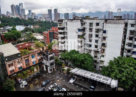 (221006) -- CHONGQING, Oct. 6, 2022 (Xinhua) -- Photo taken on Sept. 27, 2022 shows the Yichang film park, a popular scenic spot and a business incubation base transformed from former industrial site, in Yuzhong District, southwest China's Chongqing.  In recent years, Chongqing has rebuilt and renovated a large number of idle and abandoned buildings in Yuzhong District.    The renewed buildings and neighborhoods have attracted many young entrepreneurs to start their business in catering, cultural and creative industries, and also helped promote tourism in Chongqing. (Xinhua/Tang Yi) Stock Photo