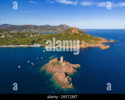 France, Var, Corniche de l'Esterel or corniche d'Or, Saint Raphael, Ile d'Or in front of the Cap du Dramont with Agay bay and Massif de l'Esterel in the background (aerial view) Stock Photo