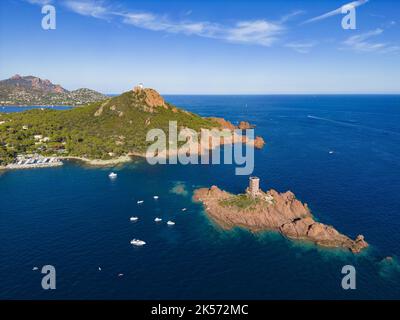 France, Var, Corniche de l'Esterel or corniche d'Or, Saint Raphael, Ile d'Or in front of the Cap du Dramont with Agay bay and Massif de l'Esterel in the background (aerial view) Stock Photo