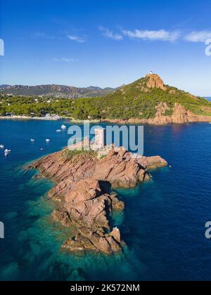 France, Var, Corniche de l'Esterel or corniche d'Or, Saint Raphael, Ile d'Or in front of the Cap du Dramont with Massif de l'Esterel in the background (aerial view) Stock Photo