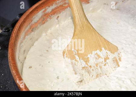 France, Drome, Drome Provencal, Dauphine, Montelimar, Maison Arnaud Soubeyran (craftsman confectioner since 1837), production of Montelimar nougat (honey, almonds, pistachios, unleavened bread, egg whites) in a copper cauldron Stock Photo