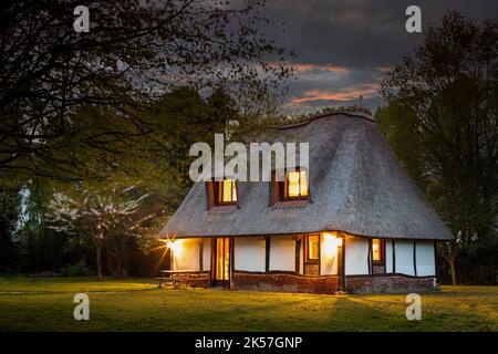France, Eure, Route des Chaumières loop, near Pont-Audemer, Norman half-timbered house with thatched roof Stock Photo