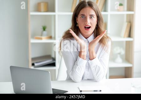 pleasant news excited woman office work surprised Stock Photo