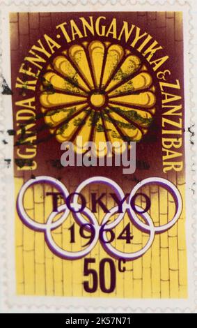 Photo of a postage stamp for the 1964 Tokyo Olympics from Uganda Kenya Tanganyika and Zanzibar Stock Photo