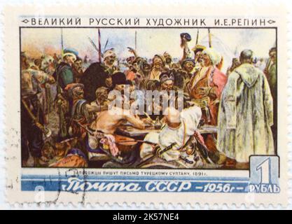 Photo of a Russian stamp Reply of the Zaporozhian Cossacks to Sultan Mehmed IV of the Ottoman Empire painting Ilya Repin 26th Death Anniversary series Stock Photo