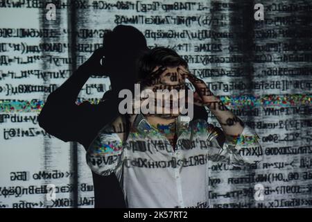 stressed man silhouette portrait cyber security Stock Photo