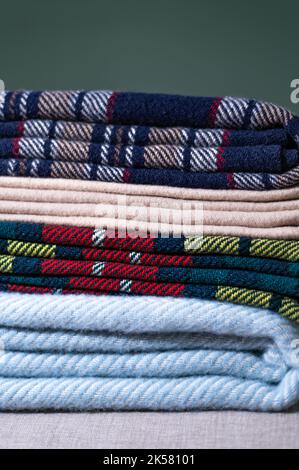 Stack of woolen checked blankets Stock Photo