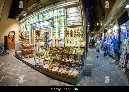 April 24 2022 - Sorrento Italy souvenir shop with traditional coloured pottery and clothes Stock Photo