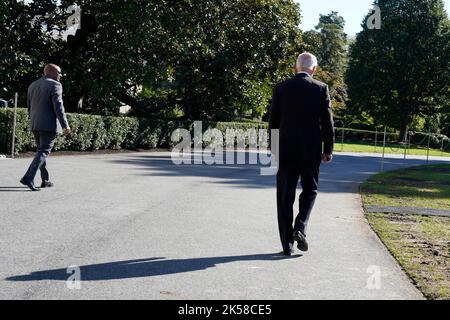 United States President Joe Biden walks to board Marine One on the South Lawn of the White House in Washington, DC before his departure to Poughkeepsie, New York on October 6, 2022. Credit: Yuri Gripas/Pool via CNP Stock Photo
