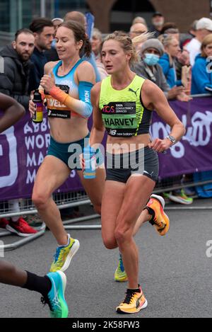 Stephanie Twell and Rose Harvey racing in the TCS London Marathon 2022 Elite Women race in Tower Hill, City of London, UK. British female athletes Stock Photo