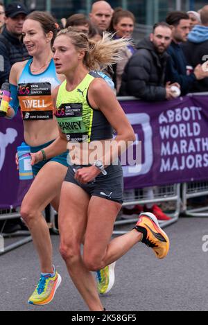 Stephanie Twell and Rose Harvey racing in the TCS London Marathon 2022 Elite Women race in Tower Hill, City of London, UK. British athletes competing Stock Photo