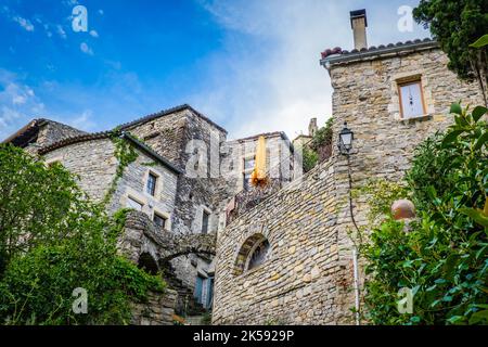 View on the beautiful stone facades and medieval houses of the small historical village of Rochecolombe in the South of France (Ardeche) Stock Photo