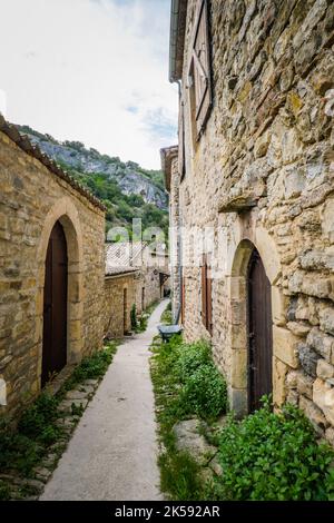 View on the beautiful stone facades and medieval houses of the small historical village of Rochecolombe in the South of France (Ardeche) Stock Photo