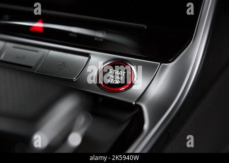 The Interior Of A 2021 Audi RS6   With Red Engine Start Button On Gloss Black Centre Console Stock Photo
