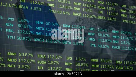 Image of stock market data processing against close up of a smartphone Stock Photo