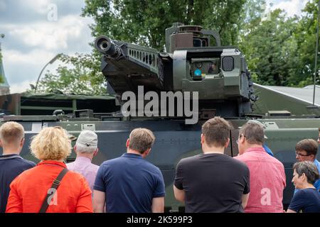 25.06.2022, Germany, NRW, North Rhine-Westphalia, Warendorf - People looking at the modern Puma armored personnel carrier on the Armed Forces Day. 00A Stock Photo