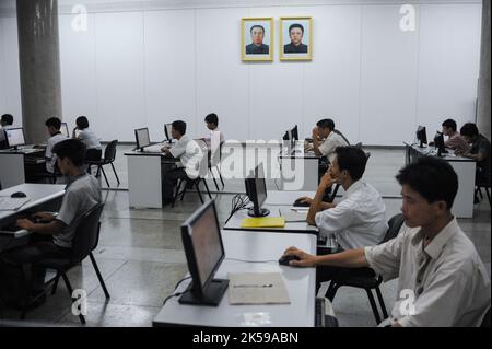 08.08.2012, North Korea, Pjoengjang - Students sit at computer workstations in the Great People's Study Hall (Great People's Study Palace), the centra Stock Photo