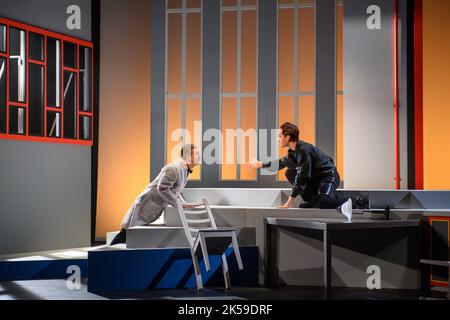 Magdeburg, Germany. 06th Oct, 2022. Nico Link (l) as an engineer and Lorenz Krieger (r) as a militarist's son rehearse a scene from the play 'Gas' in the Schauspielhaus of Magdeburg Theater. The play was written by Georg Kaiser (1878-1945) from Magdeburg. The first performance took place in 1918. It deals with the still young industrial age and the dependence on the raw material gas which progress, financial markets and armies need and which is no longer available because of a factory explosion. Credit: Klaus-Dietmar Gabbert/dpa/Alamy Live News Stock Photo
