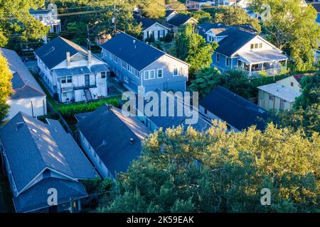 NEW ORLEANS, LA, USA - SEPTEMBER 30, 2022: Aerial view of Uptown neighborhood as dusk approaches Stock Photo