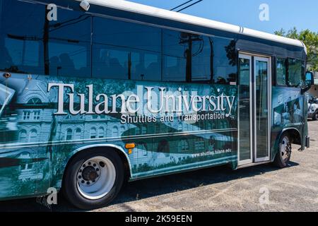 NEW ORLEANS, LA, USA - SEPTEMBER 30, 2022: Tulane University shuttle bus parked in University Square parking lot Stock Photo