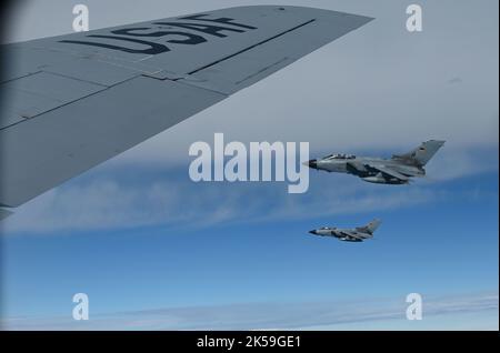 A KC-135R Stratotanker from the 155th Air Refueling Wing, Nebraska National Guard, completes a refueling mission of two German Tornado, Sept. 9, 2022, during Ample Strike Exercise. Ample Strike allows the Czech Republic, U.S., Allies and partner forces to maximize interoperability, combat effectiveness and survival awareness while operating in a dynamic and simulated high threat environment through operational and tactical training. Successful partnering activities like this result in progressive relationships and enhanced interoperability and lead to tangible, mutual benefits that improve reg Stock Photo