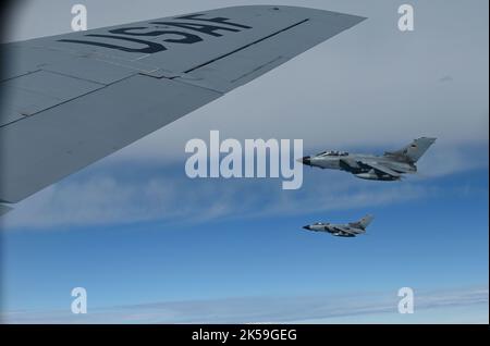 A KC-135R Stratotanker from the 155th Air Refueling Wing, Nebraska National Guard, refuels two German Tornado, Sept. 9, 2022, during Ample Strike Exercise. Ample Strike allows the Czech Republic, U.S., Allies and partner forces to maximize interoperability, combat effectiveness and survival awareness while operating in a dynamic and simulated high threat environment through operational and tactical training. Successful partnering activities like this result in progressive relationships and enhanced interoperability and lead to tangible, mutual benefits that improve regional security, access an Stock Photo