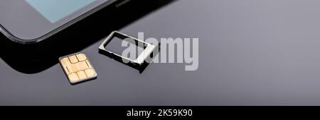 Sim Card Inserting In Smart Phone. Mobile Simcard Stock Photo - Alamy