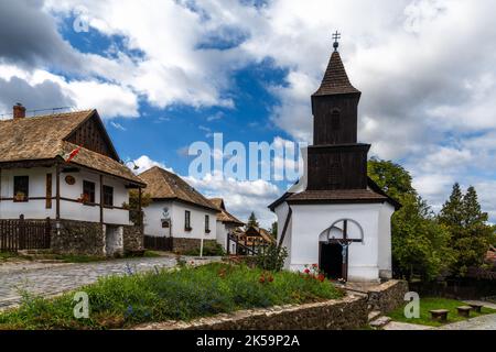 Holloko, Hungary - 3 October, 2022: view of the historic village center and old church in Holloko Stock Photo