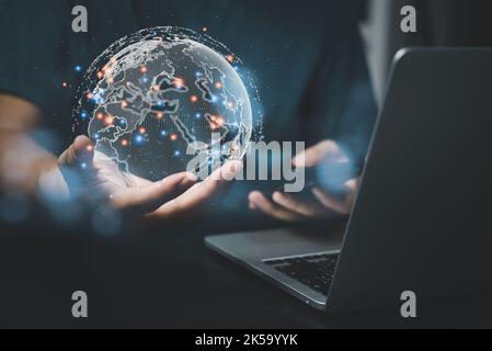 businessman holding Global network connection. big data intelligence analytics in the world Cyberspace technology strategy.business economic web trans Stock Photo