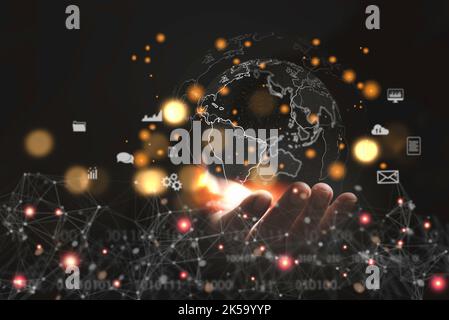 businessman holding Global network connection. big data intelligence analytics in the world Cyberspace technology strategy.business economic web trans Stock Photo