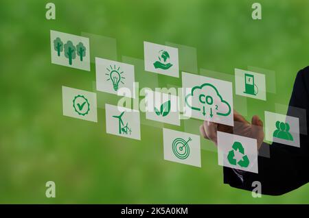 Organizations or companies develop carbon credit business virtual screen. Reduce CO2 emissions. Sustainable business development concept. Stock Photo