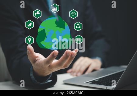 Reduce CO2 emission Net zero and carbon concept in the hand with icons, global warming for environmental climate change management eco economy develop Stock Photo