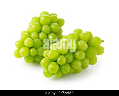 Shine Muscat grapes on a white background. White grapes. Japanese grapes. Stock Photo