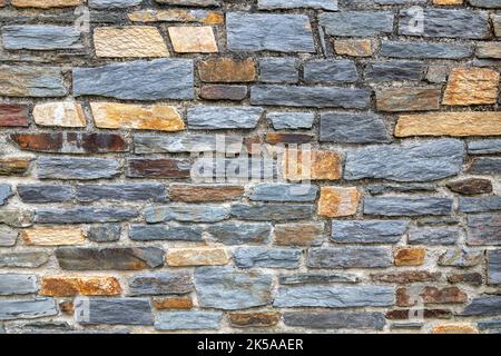 Old stonewall for background or texture Stock Photo