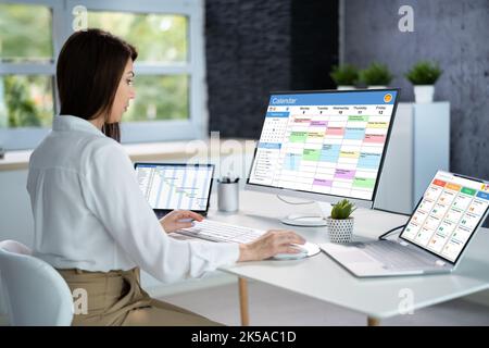 Kanban Project Management Software On Laptop. Digital Calendar Schedule Stock Photo