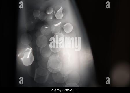 Water drops Abstract and with blurred background shines on a metal surface of a chair. Abstract macro shot Stock Photo