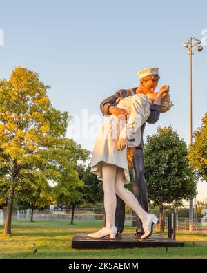 ROYAL OAK, MI/USA - AUGUST 22, 2016: Sunlight falls on the Victory in Europe (VE) Day statue, on Woodward Avenue, at Memorial Park. The statue is a re Stock Photo