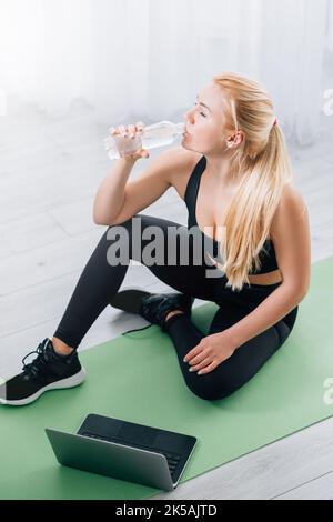 exhausted training thirsty woman home sport Stock Photo