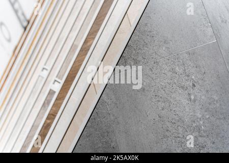 Luxury Vinyl Tile flooring samples at a high end flooring showroom Stock Photo