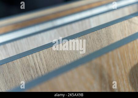 Luxury Vinyl Tile flooring samples at a high end flooring showroom Stock Photo