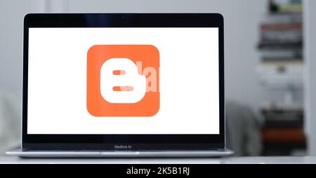 The logo of Google Blogger displayed on the screen of a laptop Stock Photo