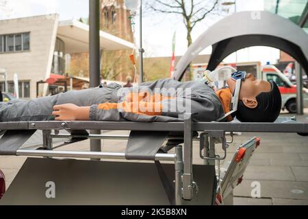 training emergency mannequin lies in a public place on the street  Stock Photo