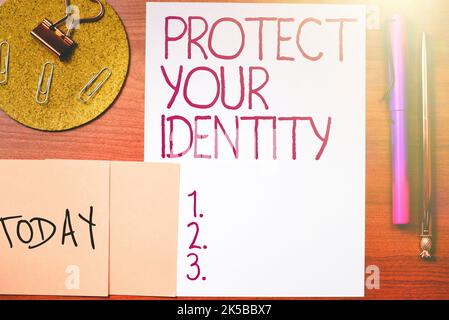Hand writing sign Protect Your Identity. Word Written on secure from data breach and information security Stock Photo