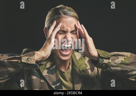 Ptsd, war and mental health with woman soldier suffering from trauma and flashback in a dark studio, stress and anxiety. Psychology, depression and Stock Photo