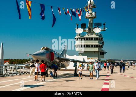 A Nanchang Q-5 ground attack aircraft, a Chinese development of the MiG-19, seen on the flight deck of a fake, concrete, aircraft carrier at Oriental Stock Photo