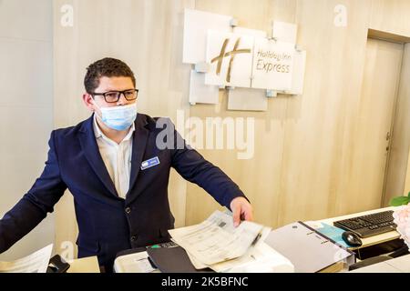 Bogota Colombia,Chapinero Norte Avenida Carrera 7,front desk lobby agent man men male,interior inside,employee employees worker workers working work w Stock Photo