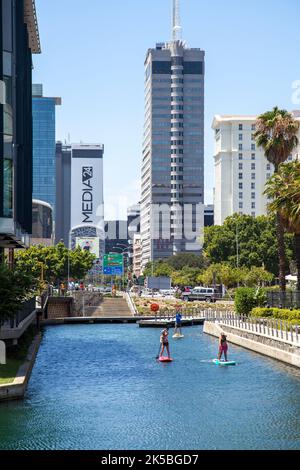 Paddleboarding on Battery Park Canals, Cape Town - South Africa Stock Photo