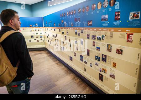 Bogota Colombia,Santa Fe Museo del Oro interior inside,Gold Museum gallery exhibit historical timeline,exhibits collection,man men male looking,Colomb Stock Photo